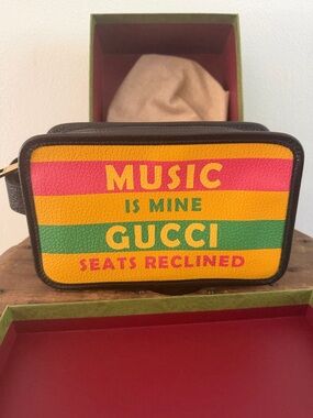 NWOT Gucci Music is Mine limited wristlet and clutch